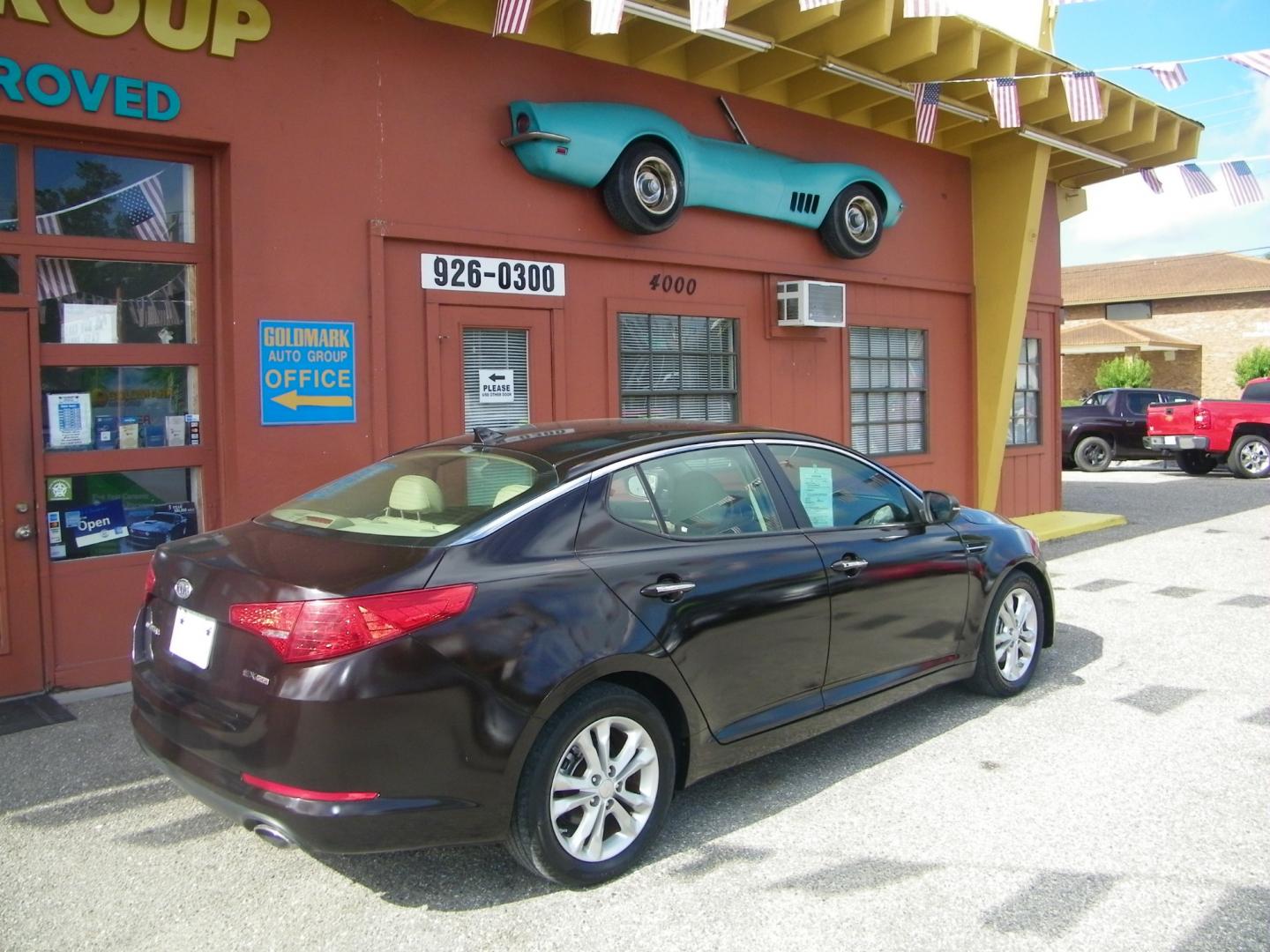 2012 Maroon /Black Kia Optima EX (5XXGN4A77CG) with an 2.4L L4 DOHC 16V engine, 6-Speed Automatic transmission, located at 4000 Bee Ridge Road, Sarasota, FL, 34233, (941) 926-0300, 27.298664, -82.489151 - Photo#3